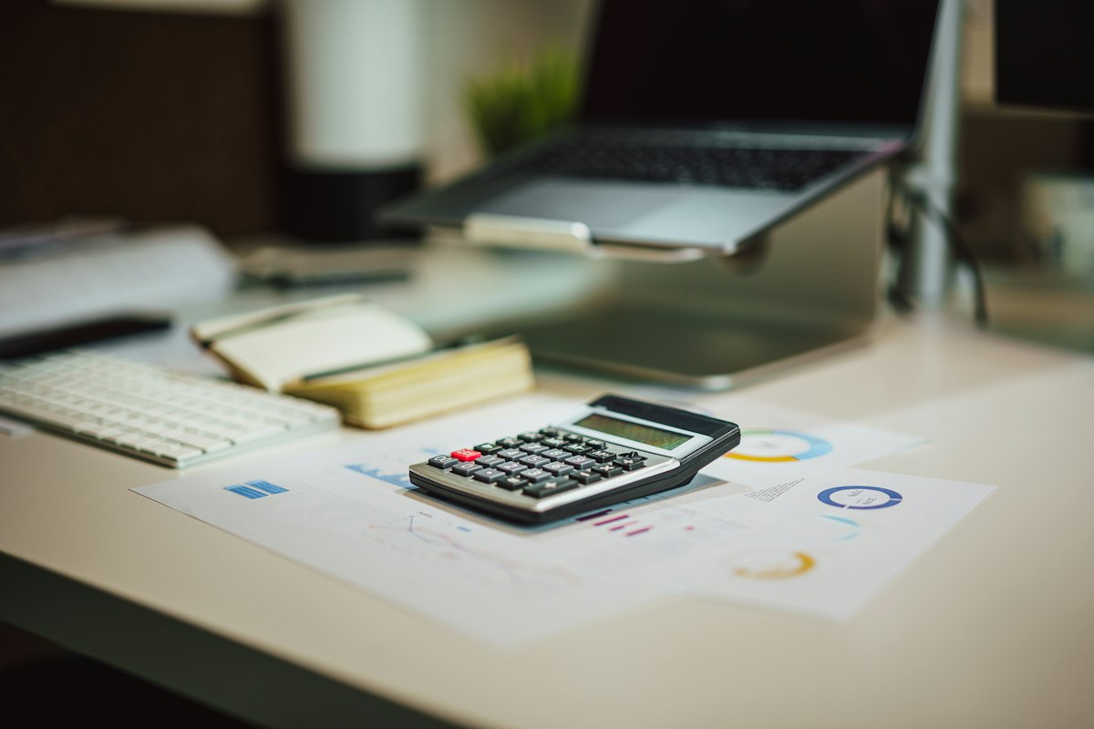 Calculator on top of LLC annual report documents