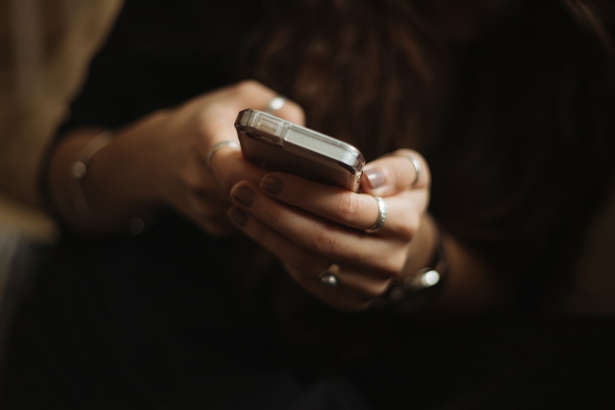 Person opening a US business bank account on a mobile app