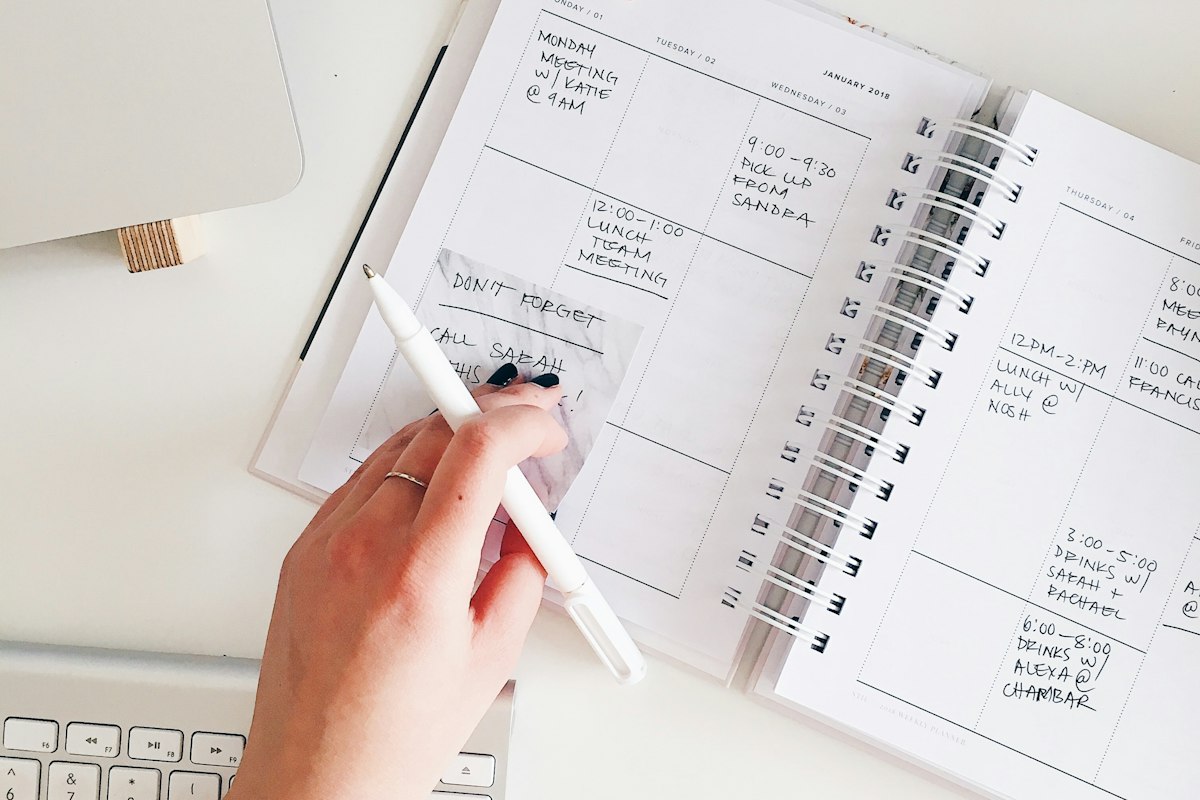 Notepad and pen for planning a process