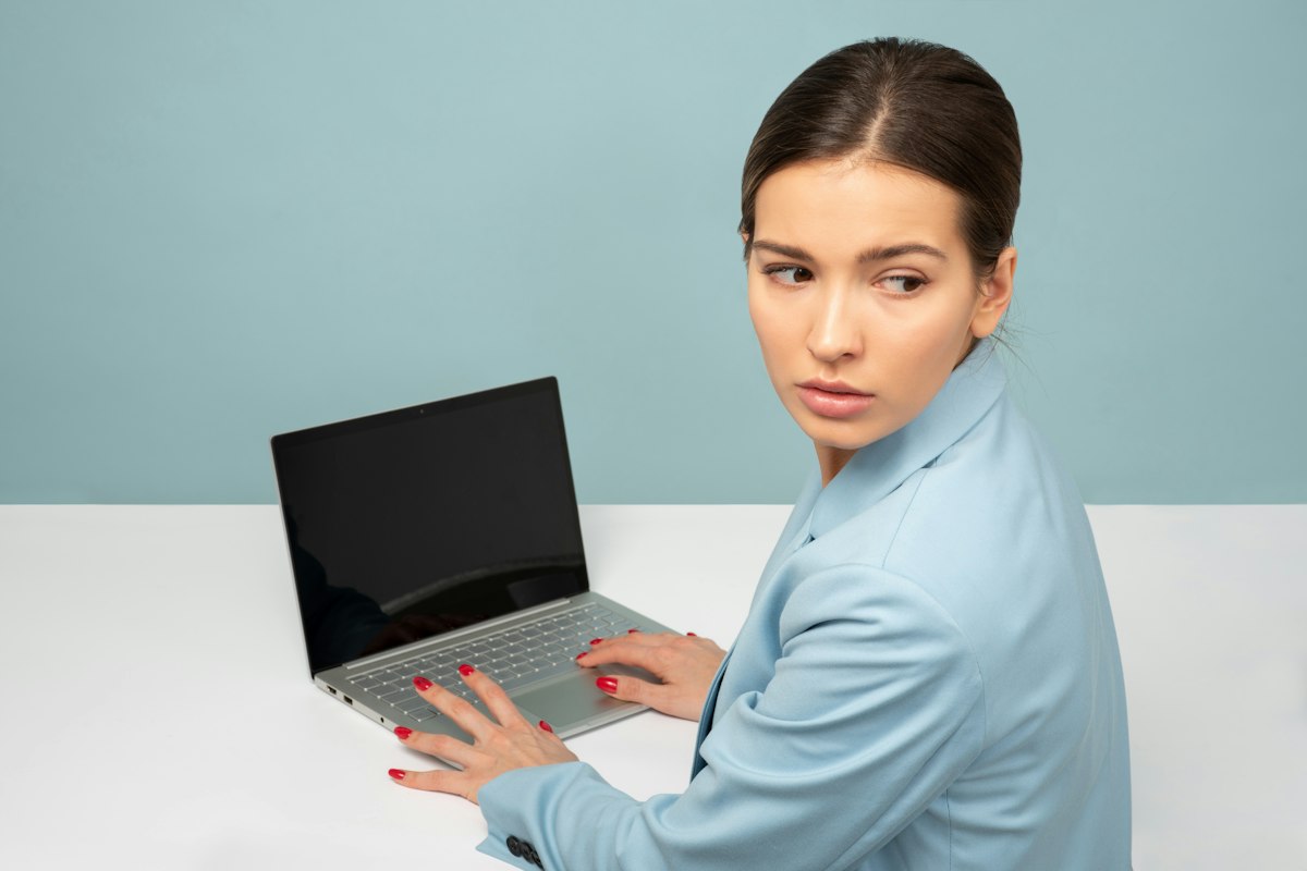 Person working through a problem on a laptop
