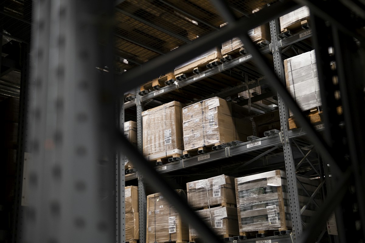 Warehouse with stacked boxes on shelves